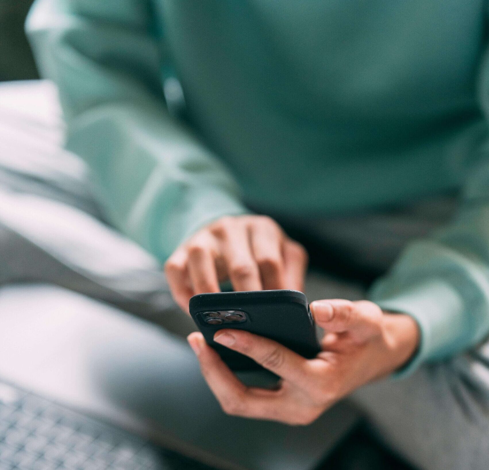 Woman on phone working